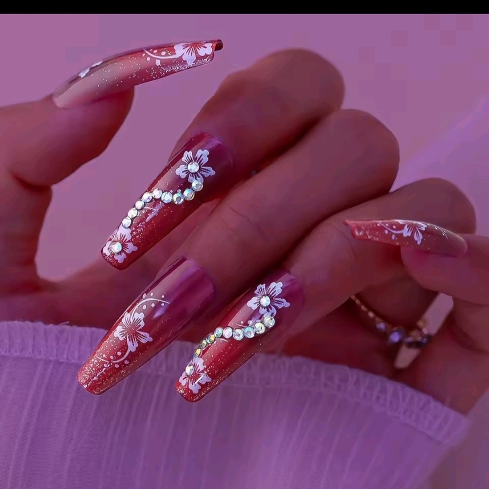 Elegant Floral Nail Art in Red and Pink